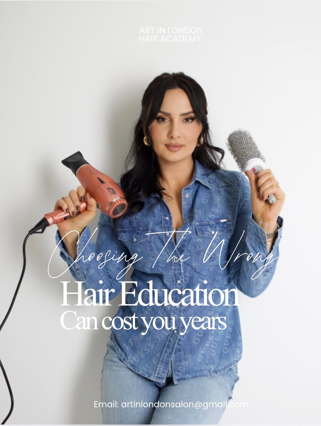 Art In London Hair Academy tutor holding a hairdryer and round brush